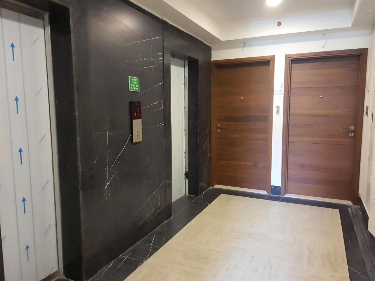 Osi Apartments Bkc Kurla West Мумбаи Экстерьер фото