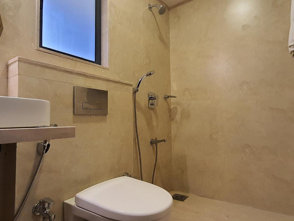 Osi Apartments Bkc Kurla West Мумбаи Экстерьер фото